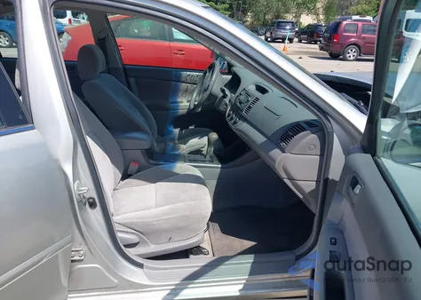 2002 Toyota Camry Le from USA, damaged, VIN 4T1BE32K32U029669